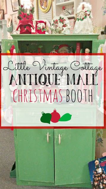 an antique cabinet with christmas decorations on top and the words, little vintage cottage antique mall christmas booth