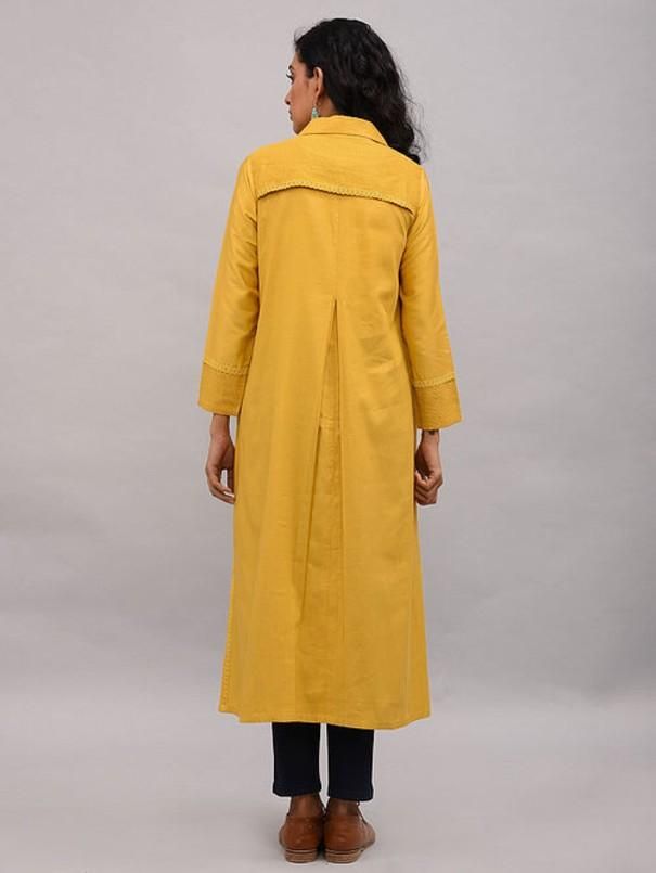 Yellow Box Pleat Cotton Silk Jacket By The Neem Tree now available at Trendroots Fall Cotton Kurta With Long Sleeves, Fitted Long Sleeve Kurta For Workwear, Spring Long Sleeve Kurta With Pintucks, Spring Long Sleeve Pintuck Kurta, Fitted Long Sleeve Kurta With Pintucks, Cotton Kurta For Work With Long Sleeves, Long Sleeve Single Breasted Nehru Jacket For Workwear, Cotton Long Sleeve Blazer For Daywear, Workwear Straight Kurta With Set-in Sleeves