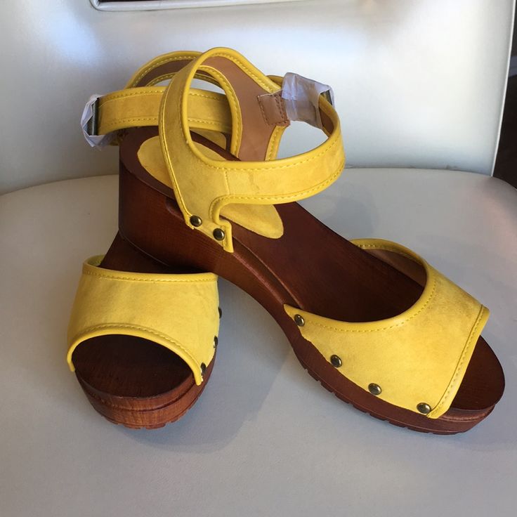 Reposhing This Item I Purchased From @Bettysclosets. Loved It, But They Were Too Small For Me To Wear. Questions? Leave A Comment Below! Yellow Comfortable Clogs With Cushioned Footbed, Comfortable Yellow Clogs With Cushioned Footbed, Yellow Open Toe Clogs For Summer, Yellow Open Toe Summer Clogs, Casual Yellow Closed Toe Wedge Sandals, Casual Ankle Strap Clogs With Cushioned Footbed, Yellow Clogs With Cushioned Footbed For Spring, Yellow Platform Clogs With Round Toe, Yellow Platform Clogs For Summer