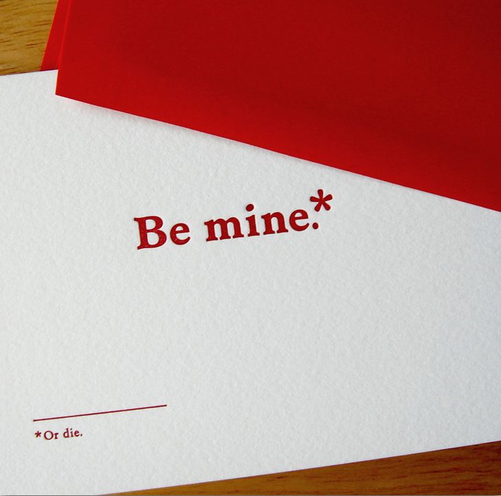 two red and white envelopes with the words be mine on them sitting next to each other