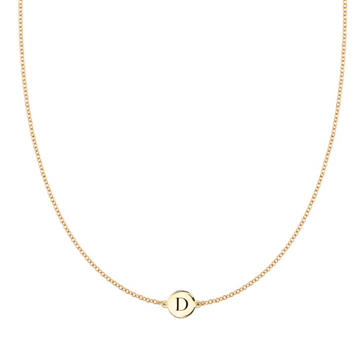 Our Initial Collection is subtle, easy and made to follow your lifestyle, like a second skin: Small enough to sleep in and never take off. The Solitaire Initial Necklace in solid 14k gold is available in various lengths. The initial is engraved on both sides of the disc so it's ok if it flips! After the initial is engr Necklace Initial Letter D, Letter D Necklace, N Necklace, D Necklace, M Necklace, Gold Disc Necklace, Mini Necklace, Initial Necklace Gold, Gold Disc