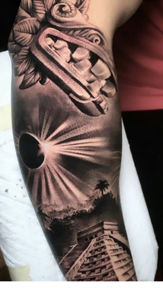 a person with a tattoo on their arm