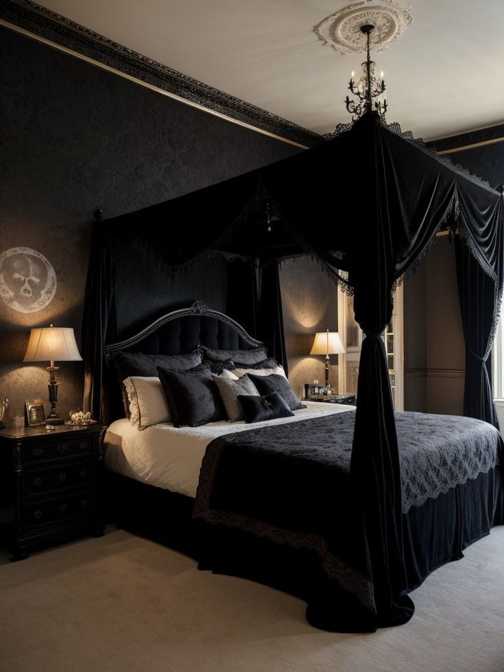 a black and white bedroom with four poster bed