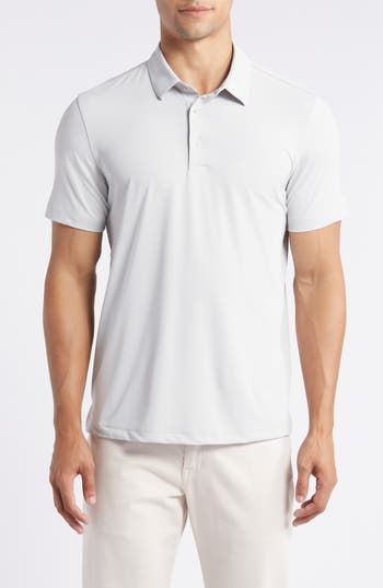 A smart-casual look for warm weather, this solid-hued polo is made from smooth, stretchy performance jersey that keeps you feeling comfortable. Button half placket Spread collar Short sleeves 88% polyester, 12% polyurethane Machine wash, tumble dry Imported Sporty Relaxed Fit Polo Shirt For Golf, Collared Polo Shirt For Golf In Athleisure Style, Athleisure Collared Polo Shirt For Golf, Casual Go-dry Polo Shirt For Golf, Casual Stretch Polo Shirt For Sports, Collared Sports Top With 4-way Stretch, Fitted Polo Shirt For Golf In Athleisure Style, Classic Solid Color Golf Tops, Fitted Athleisure Polo Shirt For Golf