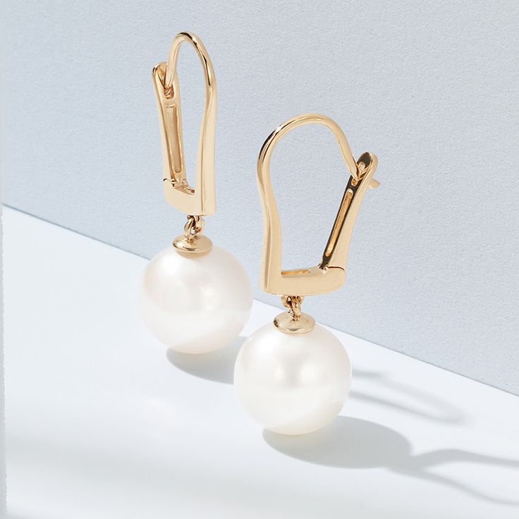 14K Yellow Gold Freshwater Cultured Pearl Leverback Earrings. These gorgeous earrings will have you feeling like a princess everyday. Casual enough for daily wear and formal enough for a black tie wedding, these earrings make the perfect gift! Classic White Gold Earrings With Timeless Design, Classic White Gold Earrings, Luxury Teardrop Bridal Earrings For Formal Occasions, Elegant Round Pearl Earrings For Evening, Elegant Earrings With Timeless Design As Gift, Elegant Gift Earrings With Timeless Design, Elegant Timeless Design Earrings As Gift, Elegant Earrings With Timeless Design, Modern White Pearl Earrings For Formal Occasions