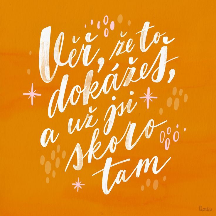 the words are written in white ink on an orange background with stars and circles around it