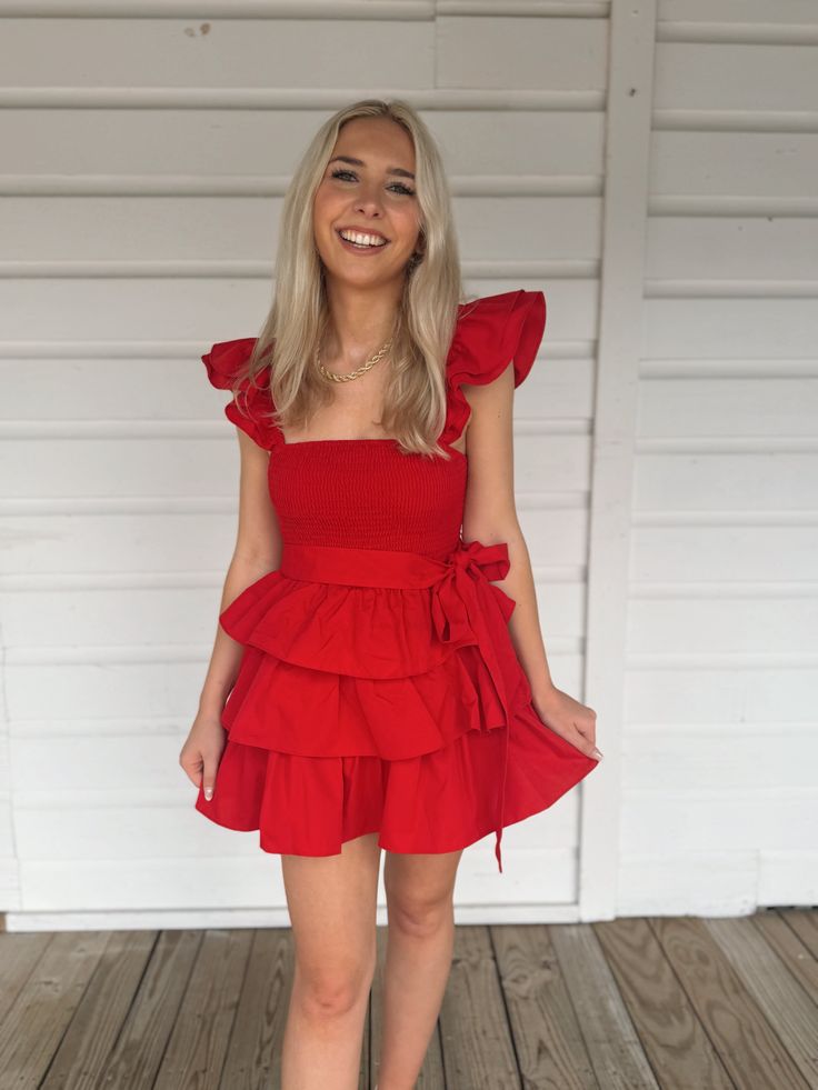 Adorable red ruffle tiered romper with a detachable waist tie and ruffle straps. Model is 5'4" with a 25" waist, 32" bust, and 32" hips wearing a small. Barbie Collection, New Arrival Dress, Holiday Collection, Waist Tie, Shoe Collection, Cute Outfits, Rompers, Red, Dresses