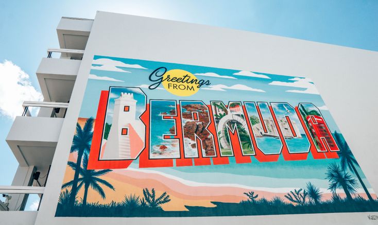 a large sign on the side of a building that says, greetings from florida