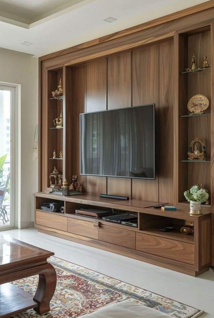 a living room with a large entertainment center