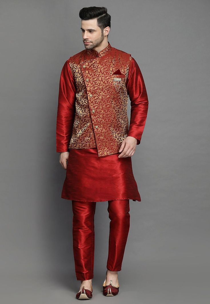 Art Silk Kurta in MaroonThis Readymade attire is Enhanced with Buttons. Crafted in Chinese Collar Neck and Full SleeveAvailable with an Art Silk Pajama in Maroon and an Art Brocade Silk Nehru Jacket in MaroonDo note: Brooch and Footwear shown in the image is for presentation purposes only. Half to one inch may vary in measurement. (Slight variation in actual color vs. image is possible) We sell all kinds of menswear. Mens Kurta | Mens Kurta Pajama | Mens Sherwani | Mens Sherwani Sets | Tradition Festive Stand Collar Traditional Wear For Diwali, Festive Kurta With Zari Work And Stand Collar, Fitted Zari Work Set With Stand Collar, Red Nehru Jacket For Diwali Designer Wear, Festive Bandhgala With Zari Work And Stand Collar, Multicolor Straight Kurta Nehru Jacket For Festivals, Multicolor Nehru Jacket Straight Kurta For Festivals, Red Designer Nehru Jacket For Festive Occasions, Festive Transitional Kurta With Stand Collar