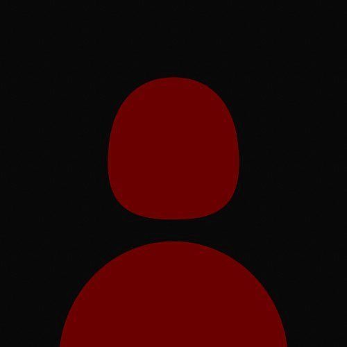 a red stop light on a black background