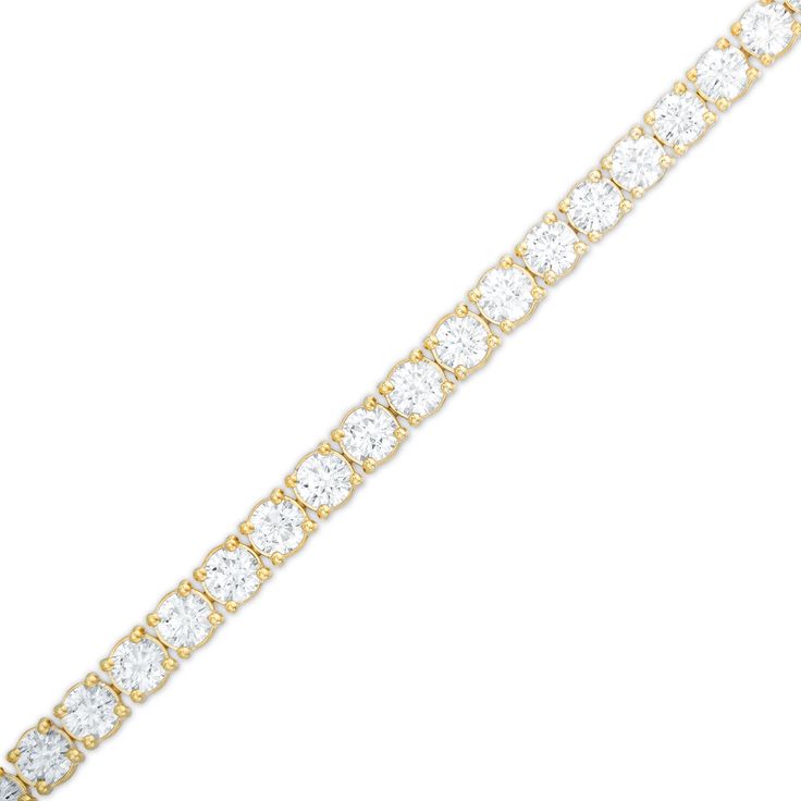 Wrap your wrist in a classic style with this magnificent diamond tennis bracelet in yellow gold. Created in 14K gold Diamonds - the largest being 1/4 ct. each - sparkle in endless line. Wear this style solo or layered with other bracelets. Breathtaking with 9 cts. t.w. of diamonds This 7.25-inch bracelet secures with a box clasp. Classic Gold Diamond Bracelet With Diamond Accents, Classic Gold Diamond Bracelet, Classic Diamond Gold Bracelet, Dazzling Gold Bracelet With Brilliant Cut, Timeless Gold Tennis Bracelet With Single Cut Diamonds, Gold Tennis Bracelet With 17 Round Cut Jewels, Classic Gold Tennis Bracelet With Diamond Accents, Classic Gold Tennis Bracelet, Brilliant Cut, Classic Gold Diamond Bracelet With Prong Setting