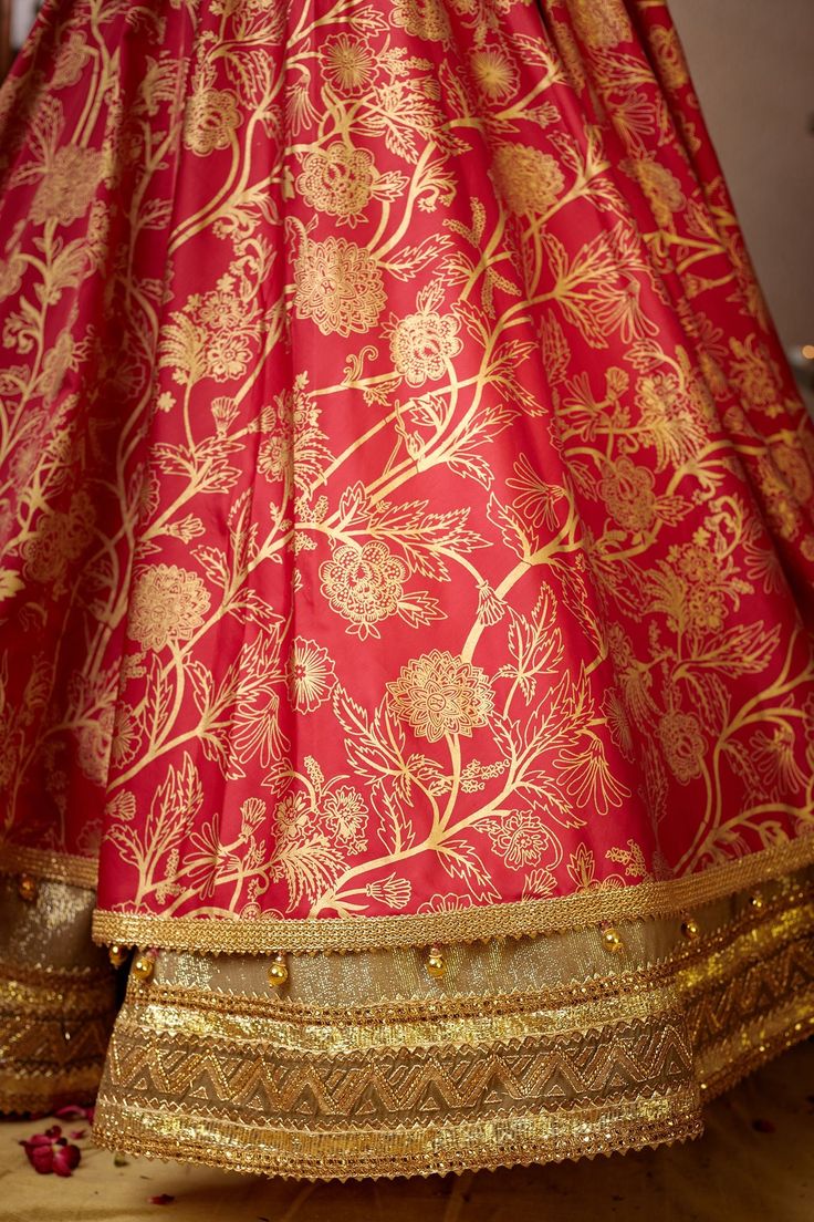 Fuchsia double layered anarkali highlighted with screen print detailing, yoke embellished with sequins and beads with lurex fabric trims on bottom layer. Paired with organza dupatta adorned with laces.
Component: 2
Pattern: Printed
Type Of Work: Screen Print
Neckline: Round
Sleeve Type: Straight
Fabric: Modal Satin and Lurex; Dupatta: Organza
Color: Pink
Other Details: 
Embroidered yoke and sleeves hem
Tassel hem dupatta
Occasion: Wedding - Aza Fashions Pink Screen, Anarkali With Dupatta, Lurex Fabric, Types Of Work, Luxury Sale, Organza Dupatta, Sequin Beading, Fabric Trim, Festival Wear