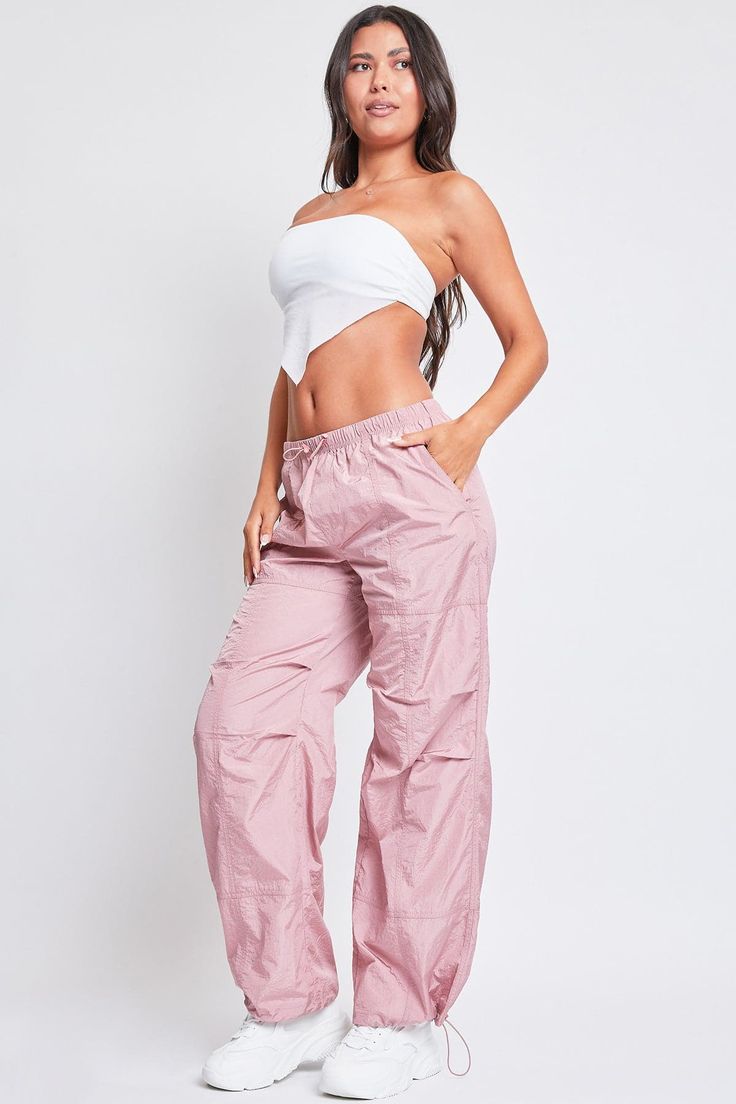 Mauve Stretch Nylon Wide-leg Parachute Pants, Pink Stretch Wide Leg Parachute Pants, Summer Wide Leg Nylon Parachute Pants, Stretch Parachute Pants Athleisure Style, Stretch Parachute Trousers Athleisure Style, Stretch Parachute Trousers For Athleisure, Stretch Athleisure Parachute Trousers, Pink Stretch Parachute Pants With Elastic Waistband, Pink Nylon Casual Parachute Pants