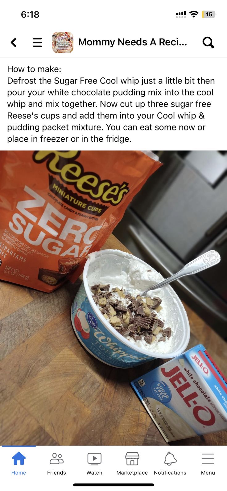 a bowl of ice cream next to a bag of cereal on top of a wooden table