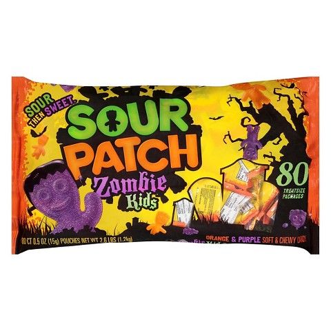 sour patch zombie kids candy bar on an orange and yellow wrapper with the word sour patch