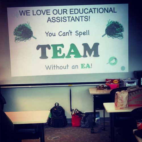 there is a screen that says we love our educational assistants you can't spell team without an ea