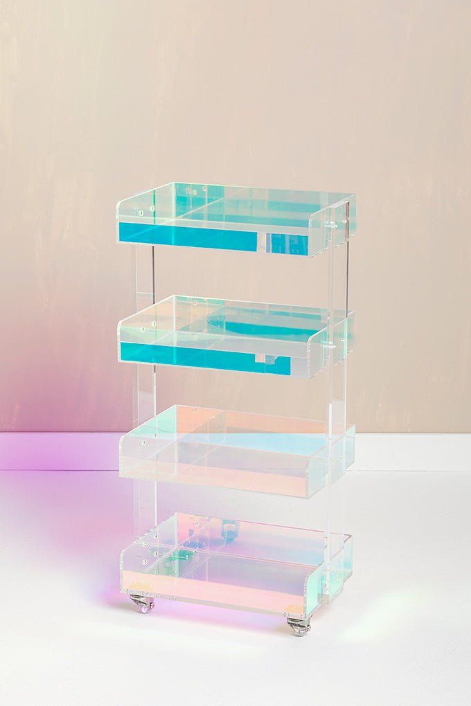 three tiered clear acrylic display case with blue and pink dividers on wheels