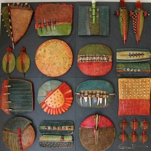 an assortment of different colored plates and spoons on a black board with white writing