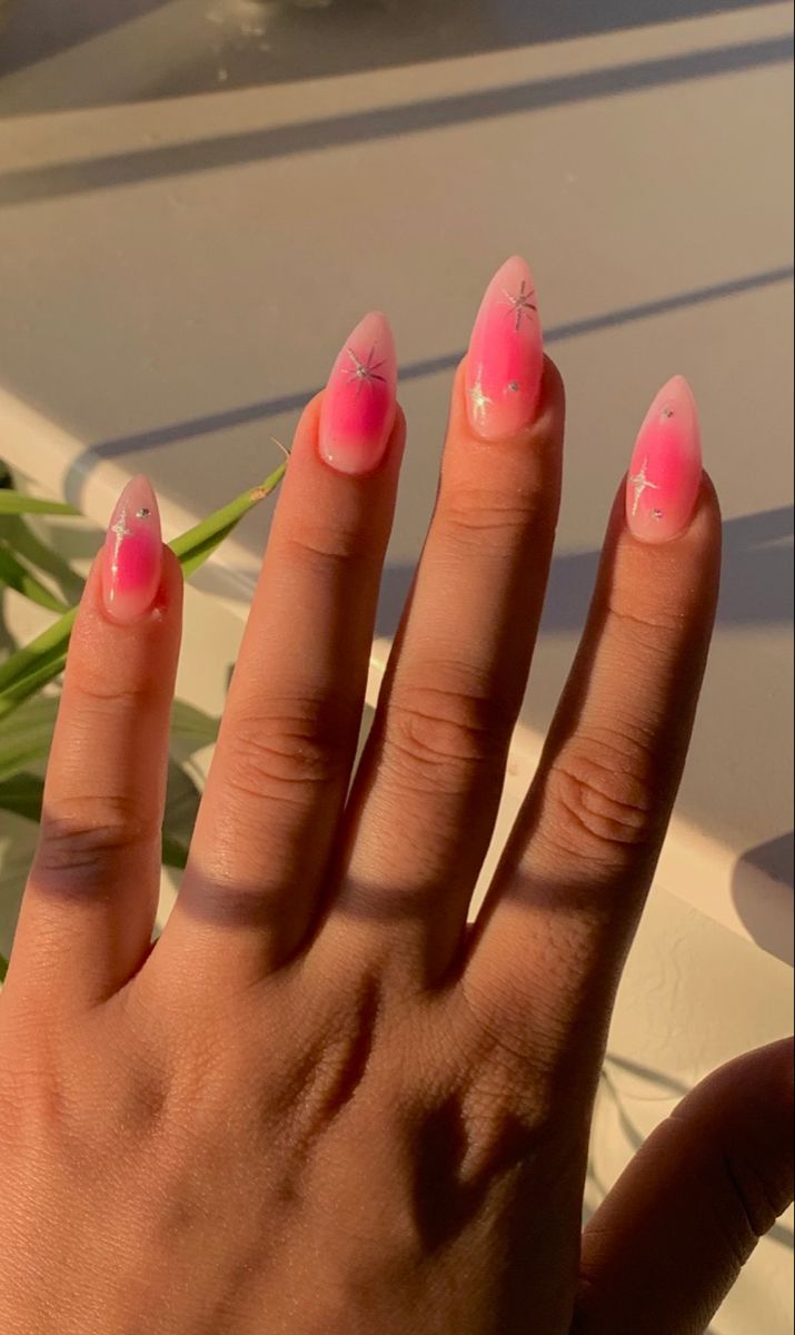 pink aura nails, pink nails, gel nails, acrylic nails, almond nails, stiletto nails, aura nails, aesthetic nails Pink Aura Nails With Gems, Pink Aura Nails Almond, Nail Inspo 2024 Almond, Birthday Nails Acrylic Coffin, Pink Oval Acrylic Nails, May Acrylic Nails, May Birthday Nails, Aura Nails Almond, Spring Almond Shaped Nails