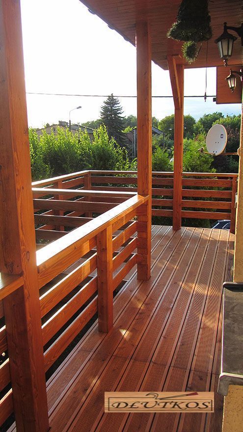 a wooden deck with a clock on it