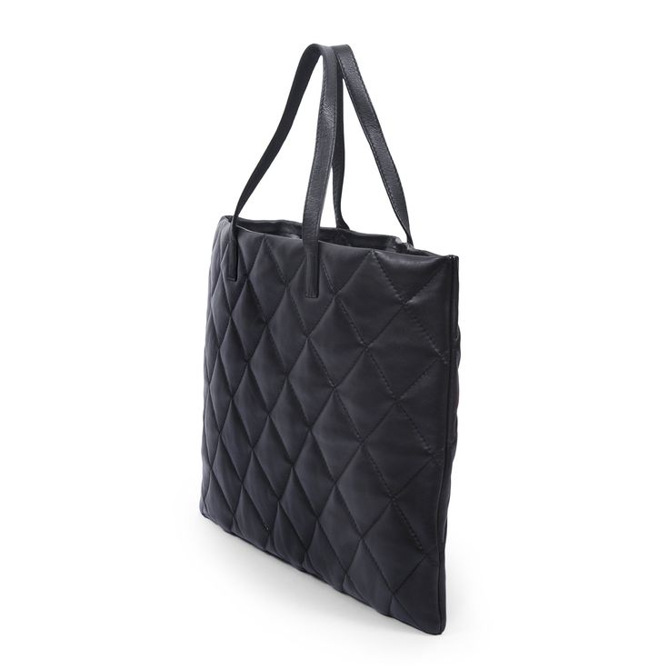 Tribeca-Matelassé leather Tote-quilted leather in all black perfect everyday classic tote, laptop and essentials fit nicely. (PRODUCT INFO): Size: 12" H x 16" W inches Handle Drop: 6" inches Material: Lambskin leather Feature: Large Interior zippered pocket; Magnetic top closure (SHIPPING INFO): All our items are made-to-order, therefore please allow 3-5 business days for production. Our goal is to become more sustainable throughout our production process, reducing overproduction and maintaining Quilted Leather Bag With Top Handle For Everyday Use, Evening Quilted Tote Shoulder Bag, Luxury Leather-lined Laptop Tote Bag, Classic Quilted Tote Shoulder Bag, Formal Quilted Tote Shoulder Bag, Leather Laptop Tote Bag, Leather Laptop Tote, Laptop Tote Bag, Laptop Tote