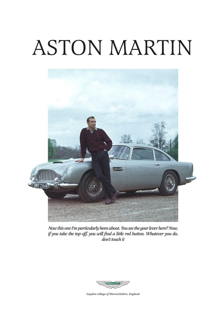 a man standing next to a car in front of a sky background with the words aston martin on it