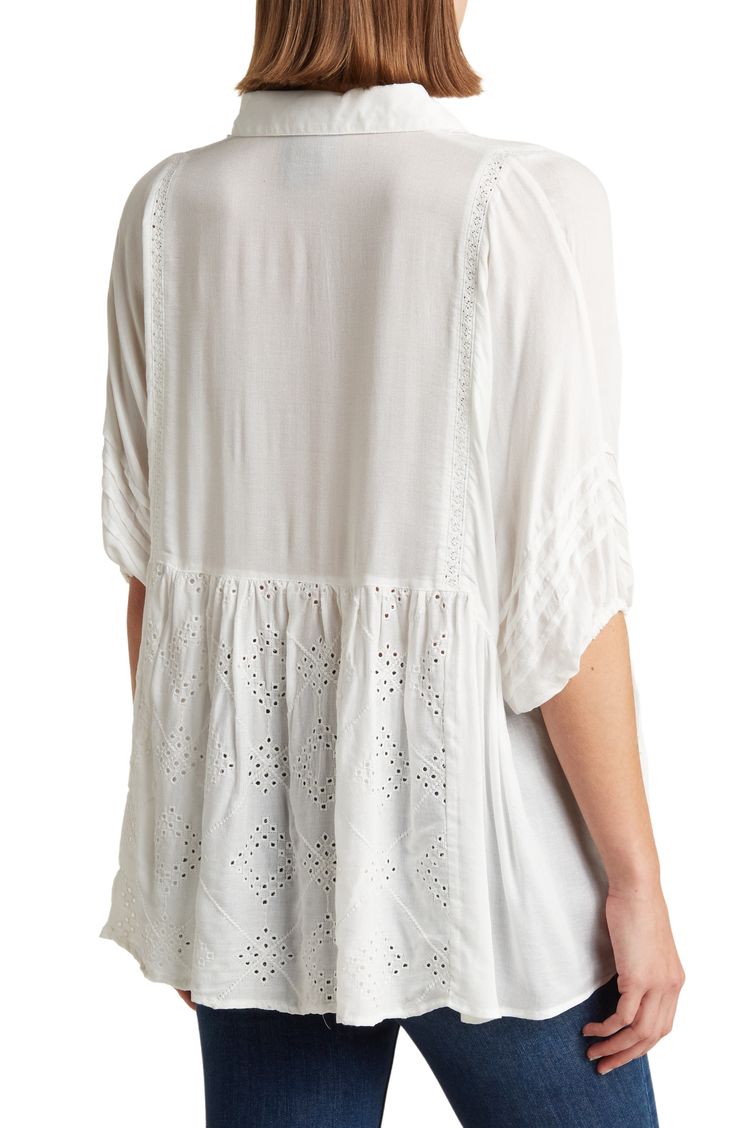 Panels of eyelet and embroidered detailing decorate this pleated blouse, finished with a front-button placket. 27'' length (size Small) Point collar Short puff sleeves 100% rayon Hand wash, line dry Imported Model stats: 5'10", 32" bust, 25" waist, 36" hip. Model is wearing size Small. Short Sleeve Tops With Pintucks For Daywear, Summer Relaxed Fit Top With Pintucks, Summer Daywear Tops With Pintucks, Casual Summer Blouse With Pintucks, Casual Pintuck Short Sleeve Tops, Casual Pintuck Blouse For Summer, Casual Short Sleeve Tops With Pintucks, Casual Pintucks Blouse For Summer, Casual V-neck Eyelet Blouse