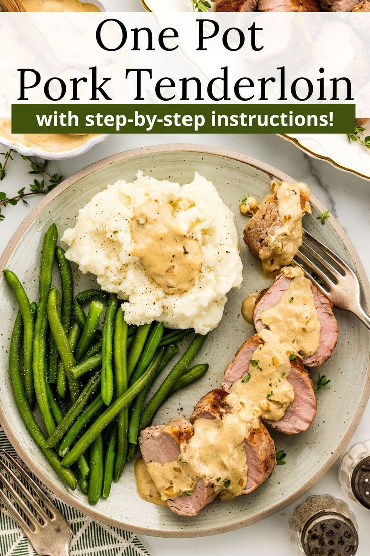 a plate with meat, mashed potatoes and green beans on it next to a fork