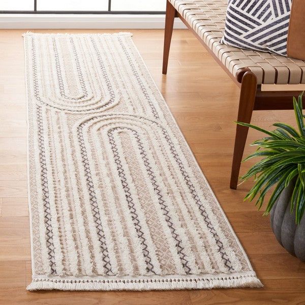 a large white rug on top of a wooden floor next to a chair and window