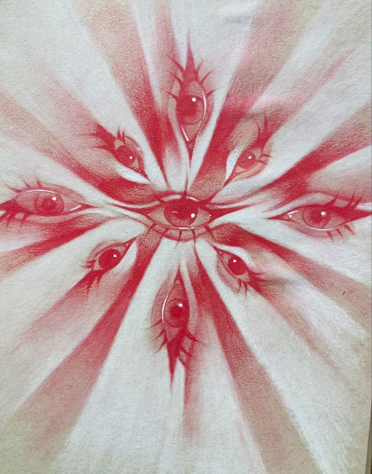 an eyeball drawing is shown in red and white with the background lightening up