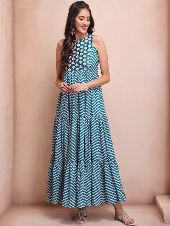 Blue ethnic DressGeometric PrintedFit and Flared ShapedV- necksleevelessFlared hemHook and Eye closure Spring Sleeveless Anarkali Dress, Traditional Multicolor Sleeveless Maxi Dress, Festive Sleeveless Anarkali Maxi Dress, Traditional Sleeveless Maxi Dress For Festive Occasions, Traditional Sleeveless Festive Maxi Dress, Sleeveless Geometric Pattern Summer Dresses, Sleeveless Summer Dress With Geometric Pattern, Traditional Sleeveless Multicolor Dress, Traditional Multicolor Sleeveless Dress