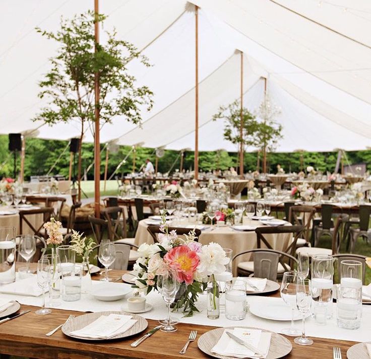 tables set up for an outdoor wedding reception