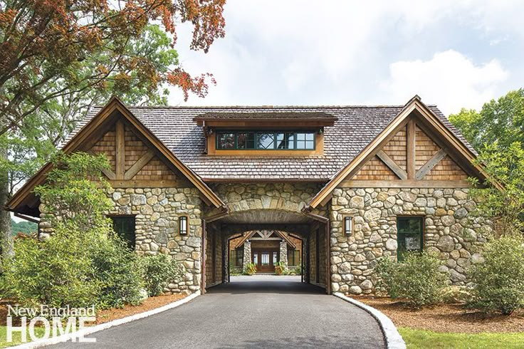 a large stone house with an arched entrance