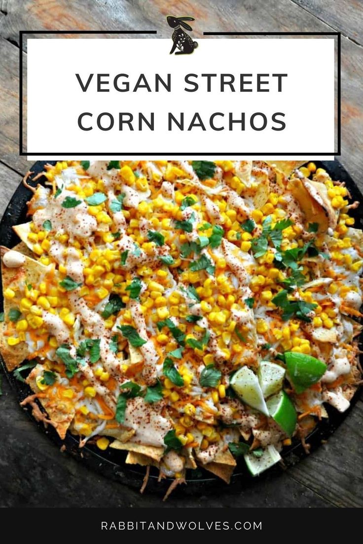 a plate with corn and tortilla chips on it that says vegan street corn nachos