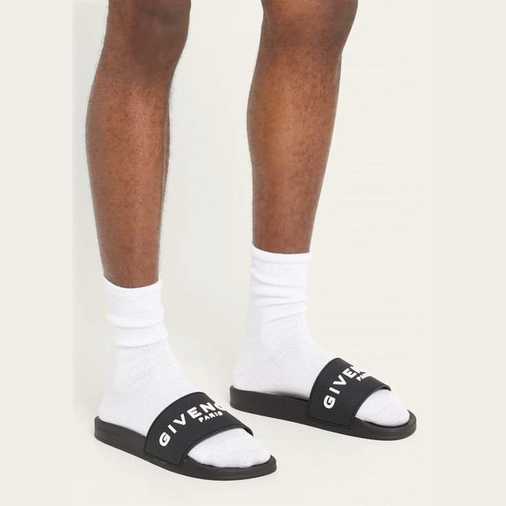 Givenchy slide sandals in rubber Flat heel Open toe Single band vamp Raised logo lettering Molded footbed Easy slide style Made in Italy Givenchy Slides, Givenchy Logo, Givenchy Man, Man Logo, Black Steel, Steel Blue, Slide Sandals, Black Sandals, Givenchy