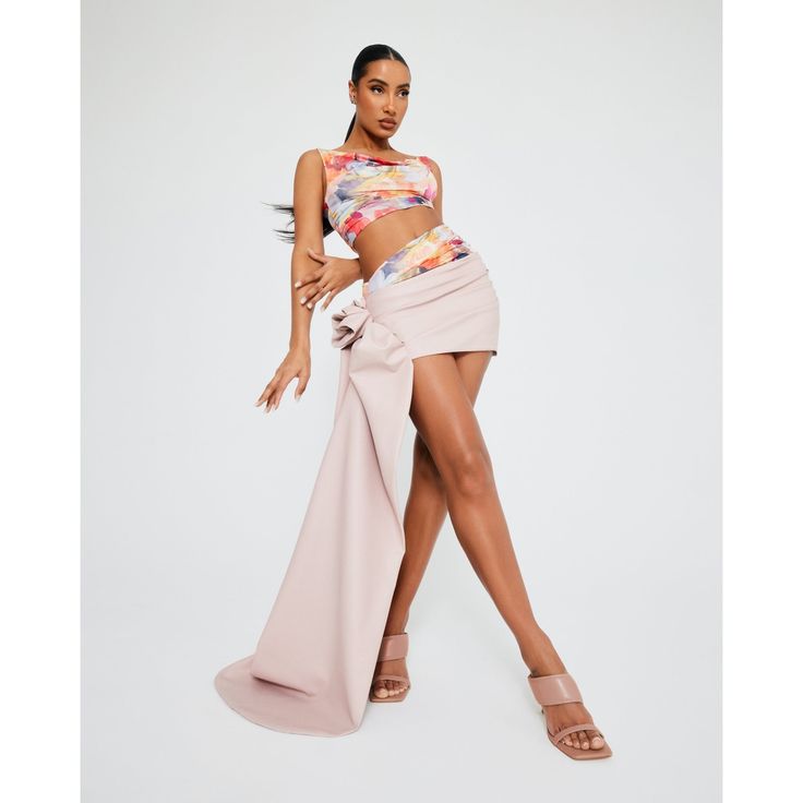 Price listed in USD. Description: Lined pastel rose vegan leather mini skirt with a long train and "haute couture" hand made draped rose at right side of skirt. Draped pleating at front of skirt and an Invisible zipper at center back. Sizing: XS, S, M, L , XL XS: Bust: 30”-32” Waist: 23”-24”,Hips: 33”-35” S: Bust: 33”-34” Waist: 25”-26” Hips: 36”-37” M: Bust: 35”-36” Waist: 27”-28” Hips:38”-39” L: Bust : 37"-38" Waist: 29"-31" Hips: 40"-41" XL: Bust 39”-40” Waist : 32”-33” Hips: 42”-43” Model is Flowy Draped Mini Skirt For Party, Asymmetrical Fitted Mini Skirt For Evening, Draped Wrap Skirt For Spring Party, Fitted Asymmetrical Mini Skirt For Evening, Draped Fitted Mini Skirt For Party, Fitted Draped Wrap Skirt For Spring, Fitted Pink Wrap Skirt For Party, Pink Fitted Mini Skirt For Evening, Pink Asymmetrical Skirt For Evening