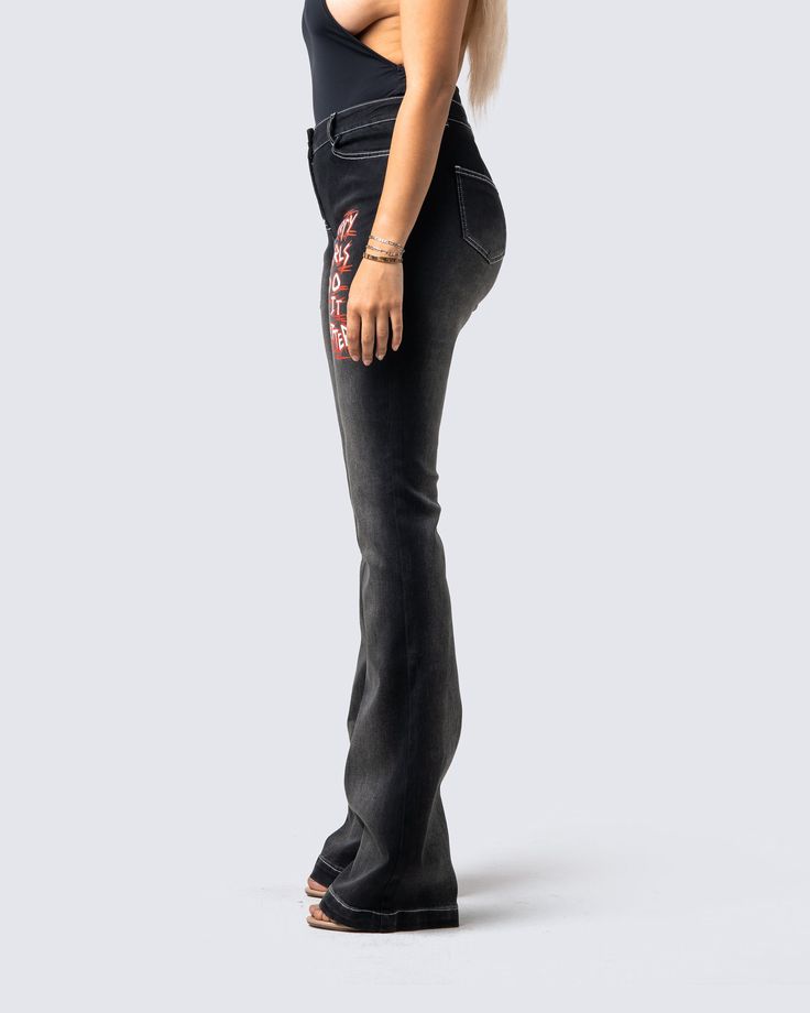 Not the type to be tamed 😝 Get down and dirty in these black low-rise pants. Made from stretch black denim, with white stitching and flare legs - these pants feature a unique red laced detail and graphic print for a sultry look ❤️ Black High Rise Fitted Flares, Black Flare Bottoms For Streetwear, Trendy Black Straight Leg Flares, Trendy Mid-rise Black Flares, Trendy Black Mid-rise Flares, Black Flare Denim Pants, Black Mid-rise Jeans With Contrast Stitching, High Waist Black Denim Flares, Trendy High Rise Black Flares