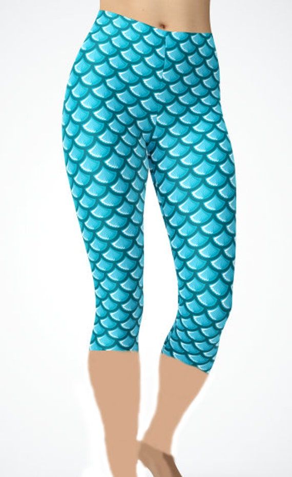 They are blue rather than a teal as they look in the photo. Mermaid Tail Leggings or Capri's. They are super milky/buttery soft  with a yoga waistband. They also have a small pocket in the waistband, credit card or key size. They are 92% polyester; 8% spandex. Stretch Turquoise Yoga Bottoms, Turquoise Stretch Yoga Bottoms, Blue Stretch Capris With Elastic Waistband, Blue Hip-length Yoga Pants, Casual Capri Length Yoga Pants For Pilates, Blue Workout Leggings With Elastic Waistband, Light Blue Stretch Yoga Pants, Blue Leggings With Elastic Waistband For Workout, Light Blue Casual Yoga Leggings