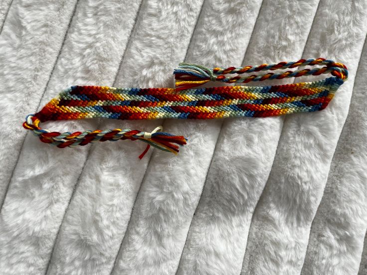 Rainbow stripe bracelet. Many beautiful colors and handmade to fit any wrist. Handmade Multicolor Friendship Wristband, Multicolor Jubilee Friendship Bracelets, Multicolor Braided Jubilee Friendship Bracelets, Multicolor Friendship Wristband, Handmade Casual Band Bracelet, Handmade Rainbow Bracelets For Friendship, Multicolor Braided Bangle Bracelets For Friendship, Adjustable Multicolor Jubilee Bracelet, Handmade Multicolor Unique Braided Bracelets