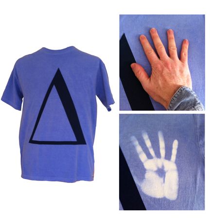 a blue t - shirt with a hand print on it