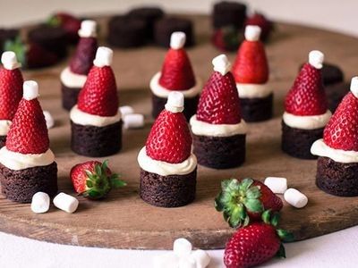 there are chocolate cakes with strawberries on top