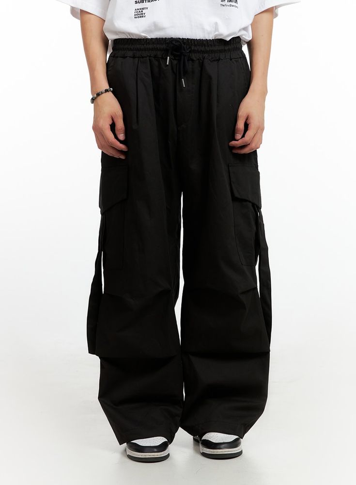 mens-cargo-chic-cotton-wide-leg-pants-black-ig402 / Black Black Straight Leg Techwear Cargo Pants, Black Techwear Cargo Pants Straight Leg, Black Baggy Utility Parachute Pants, Black Utility Parachute Pants With Relaxed Fit, Black Relaxed Fit Utility Parachute Pants, Black Cargo Style Relaxed Fit Pants, Relaxed Fit Black Cargo Pants, Black Cotton Parachute Pants, Black Parachute Pants With Side Pockets For Work