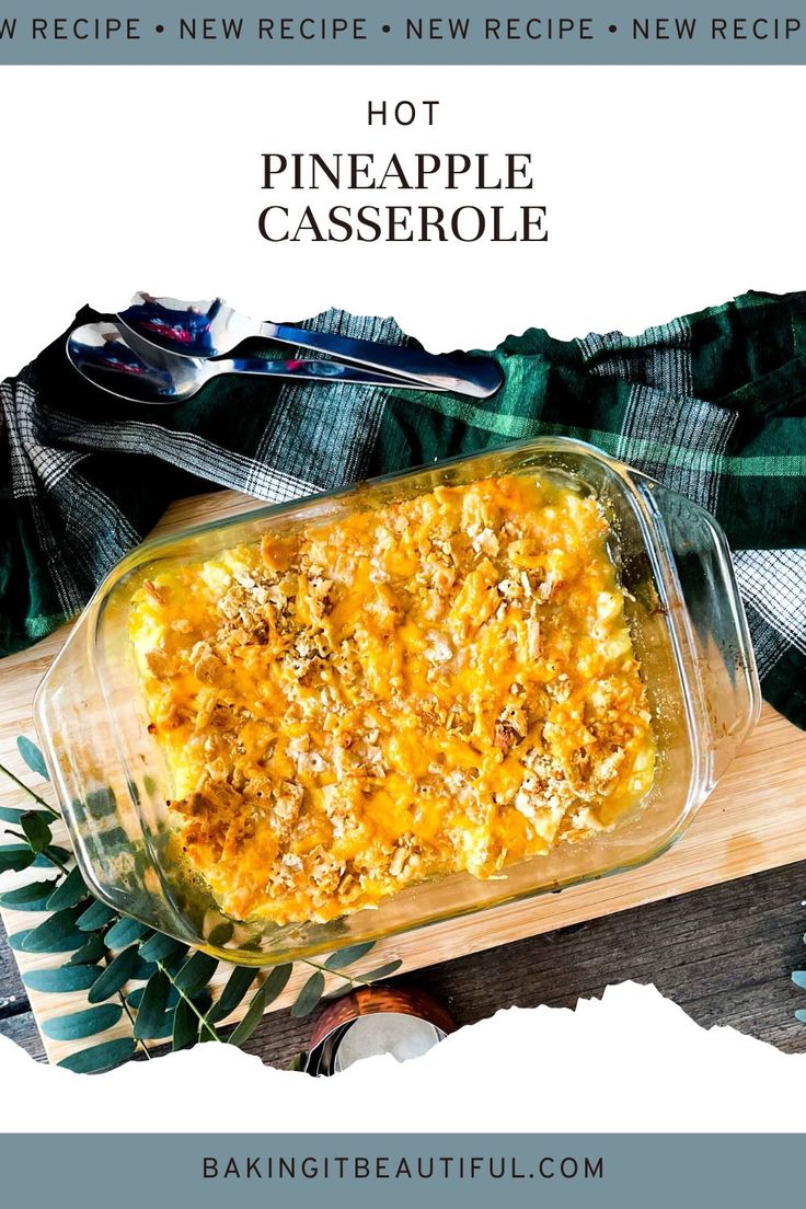 a casserole dish with pineapple in it on a cutting board next to a knife and fork