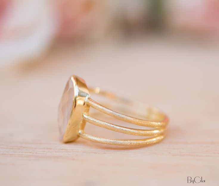 D E T A I L S — METAL: GOLD PLATED — Stone: Rose Quartz 💎 The gemstone is the Rose Quartz. ✦Rose Quartz, the crystal of Unconditional Love, it's considered a stone of the heart. It carries a soft feminine energy of compassion and peace, nourishment and comfort. BACK SIDE OF THE RING: The metal band of our rings is never completely covering the gem from the back side, so that the energy emanating from the stone will be able to flow freely toward our body and it should be quite sufficient to get Pink Stone Ring, Ring Rose Quartz, Pink Stone Rings, Rose Gold Quartz, Stone Rose, Organic Rings, Soft Feminine, Rose Quartz Ring, Pink Ring