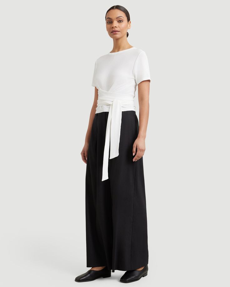 This flattering, slightly cropped blouse with wrap detailing creates an elegant silhouette — dressing up beautifully with trousers and heels, or casually with a breezy skirt or denim. See below for our general Size Guide and available measurements Made of 65% rayon and 35% nylon Machine wash cold and lay flat to dry White Wrap Blouse, Cropped Blouse, Dressing Up, Dress Silhouette, Front Tie Top, Wrap Blouse, Crop Blouse, Slides, Dress Up