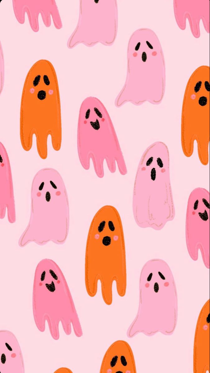 a pink and orange pattern with ghost faces on it