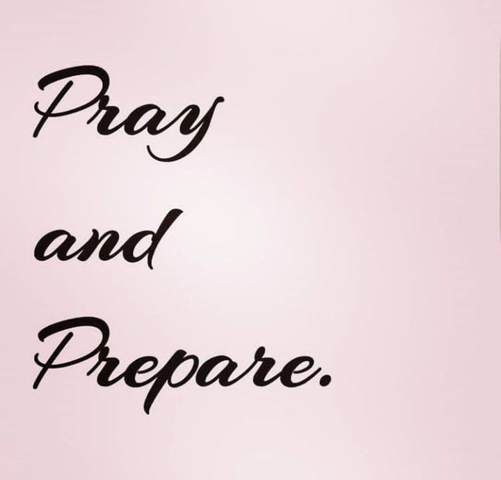 the words pray and prepare written in black ink on a pink background with a pen