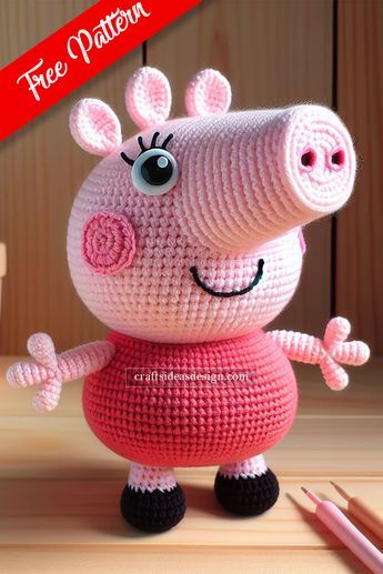 a crocheted pig is standing on its hind legs and has eyes wide open