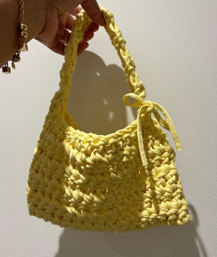 Handcrafted by me using recycled cotton t-shirt yarn ♻️💛 ♡ minimalist design ♡ spacious- fits all your essentials  ♡ handcrafted with care and attention to detail ♡ designed to make a statement add some sunshine to your accessory collection with this piece ☀️ Feel free to reach out to discuss personalised variations of this aesthetic bag️ Handmade Cotton Crochet Bag, Casual Crochet Cotton Yarn Beach Bag, Casual Cotton Yarn Crochet Bag For Beach, Casual Cotton Crochet Bag Rectangular Shape, Casual Crochet Yarn Bag For Summer, Casual Cotton Crochet Bag For Everyday, Casual Cotton Crochet Bag For Daily Use, Casual Everyday Crochet Cotton Bag, Casual Beach Crochet Bag In Cotton Yarn